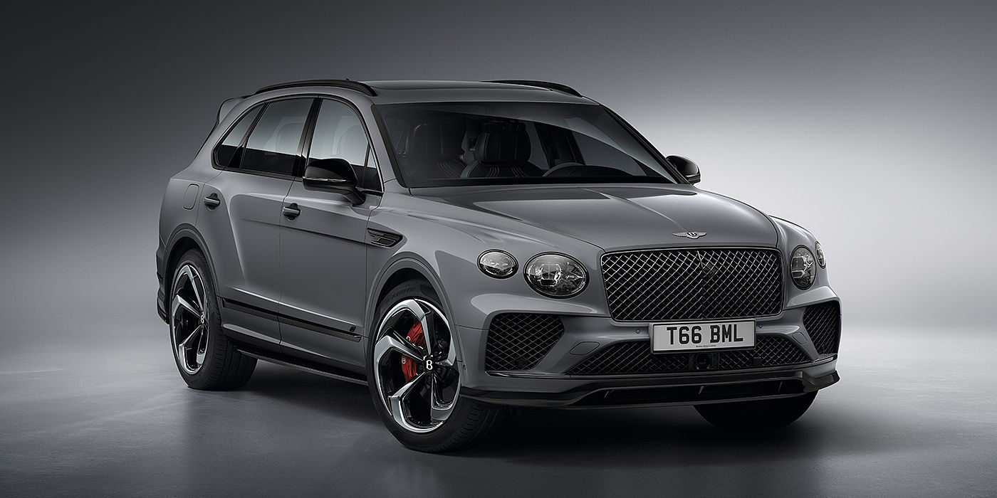 Bentley Baku Bentley Bentayga S in Cambrian Grey paint front three - quarter view with dark chrome matrix grille and featuring elliptical LED matrix headlights. 