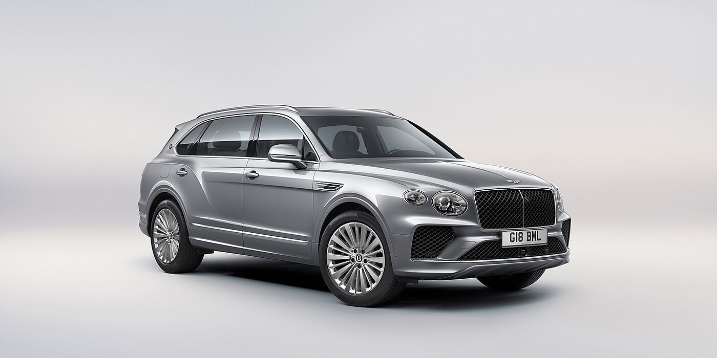 Bentley Baku Bentley Bentayga Extended Wheelbase luxury SUV front three quarter view in Moonbeam paint with 21 inch five spoke painted wheels