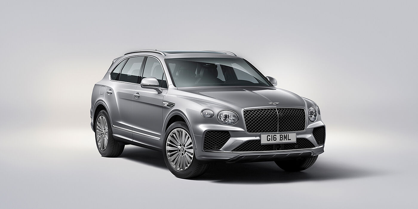 Bentley Baku Bentley Bentayga luxury SUV front three quarter view in Moonbeam paint with matrix grille and 21″ 5 spoke painted wheels