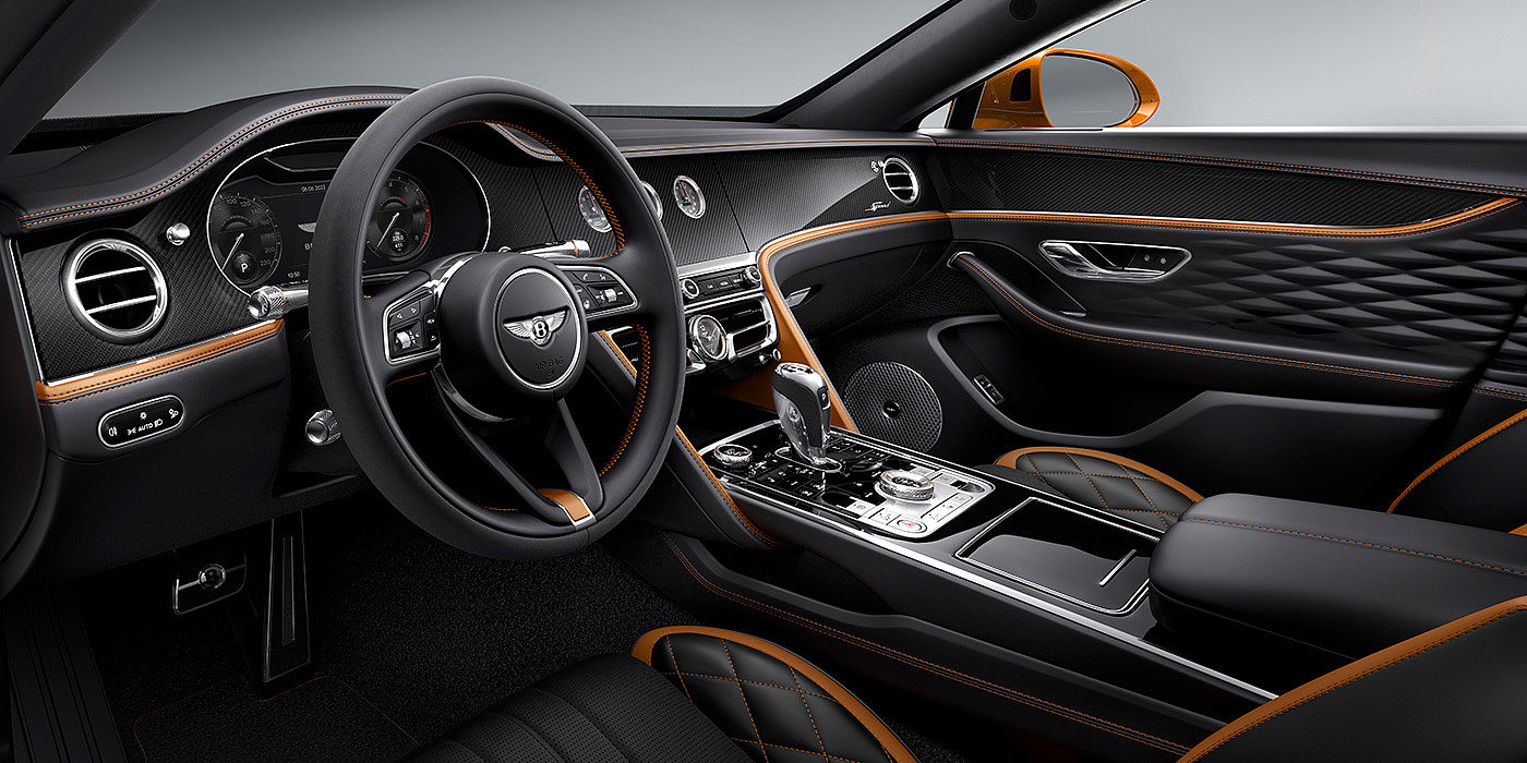 Bentley Baku Bentley Flying Spur Speed driver's view - featuring Single Tone, 3 spoke steering wheel in High Gloss Carbon Fibre veneer.