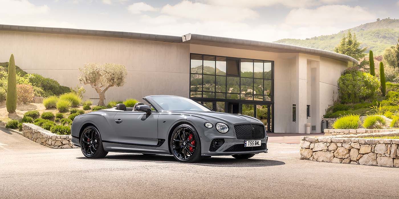 Bentley Baku Bentley Continental GTC S convertible in Cambrian Grey paint front 34 static near house