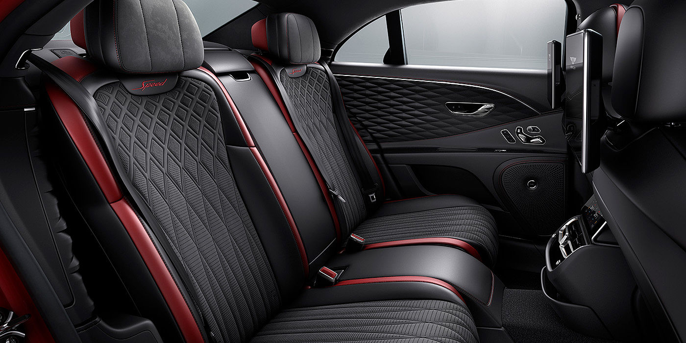 Bentley Baku Bentley Flying Spur Speed sedan rear interior in Beluga black and Cricket Ball red hide