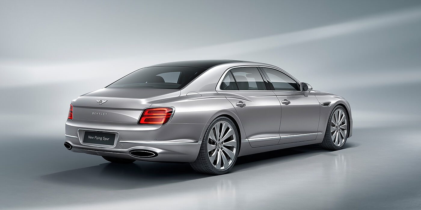 Bentley Baku New Bentley Flying Spur sedan rear view in Silverlake paint with ten spoke wheels and chrome matrix grille