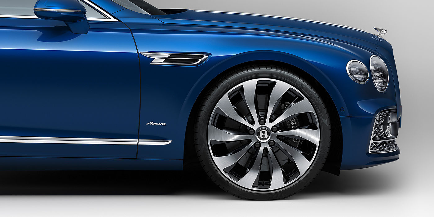 Bentley Baku Bentley Flying Spur Azure sedan side close up in Sequin Blue paint with Azure badge