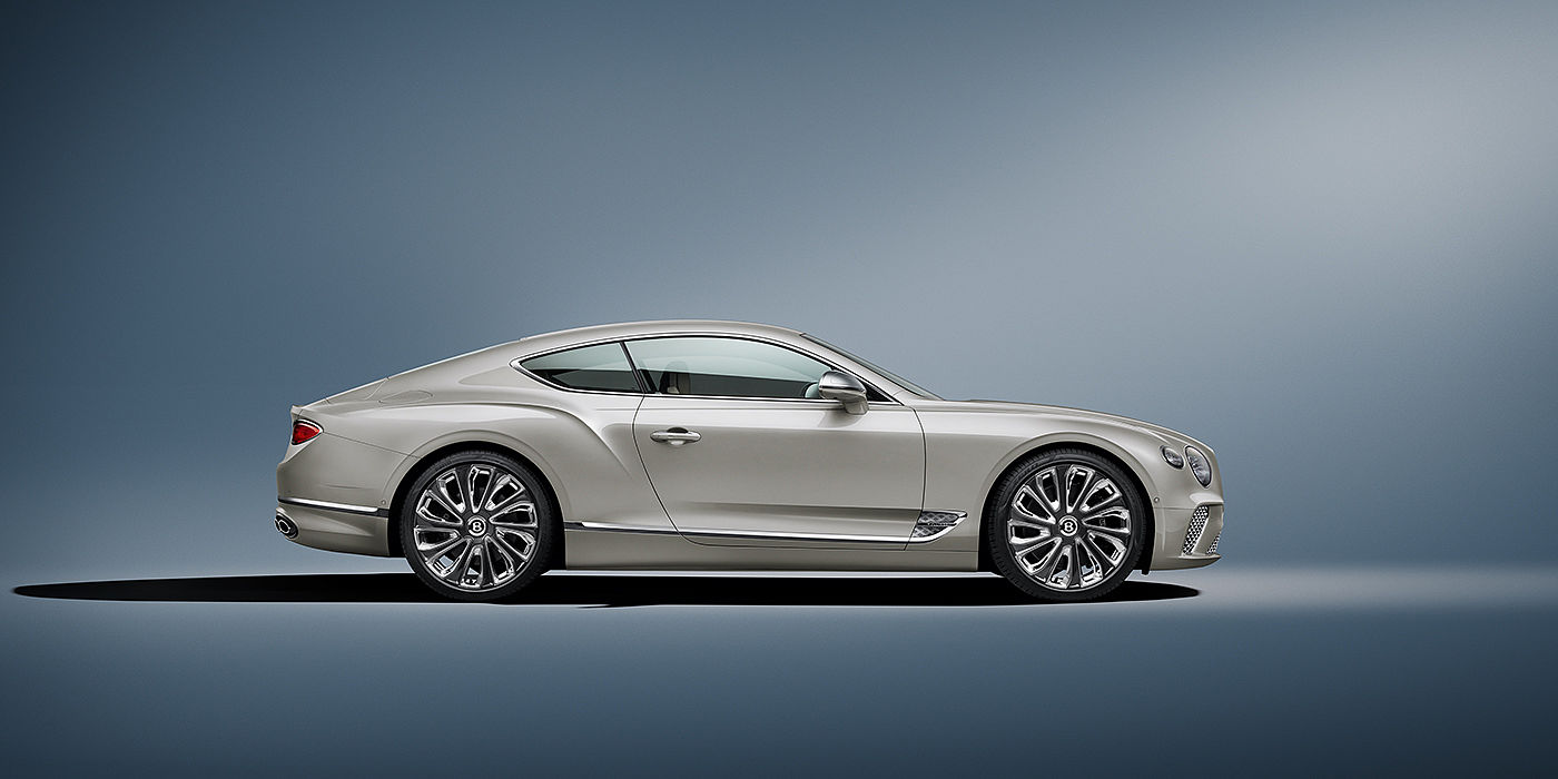 Bentley Baku Bentley Continental GT Mulliner coupe in White Sand paint front 34