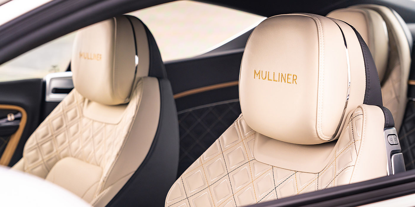 Bentley Baku Bentley Continental GT Mulliner coupe seat detail in Beluga black and Linen hide