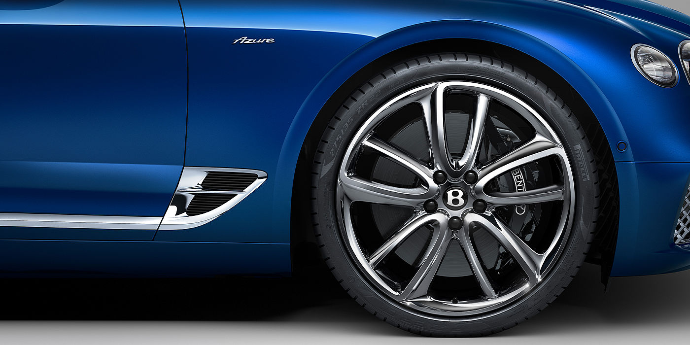 Bentley Baku Bentley Continental GTC Azure convertible in Sequin Blue paint side profile with Azure badge close up